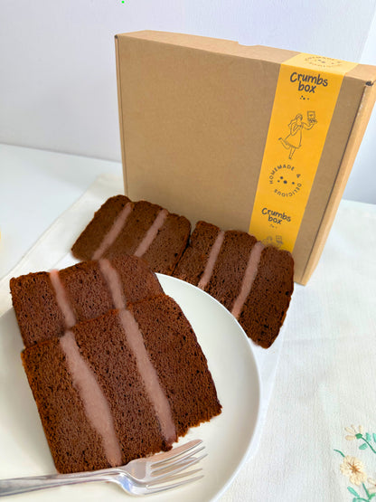 Homemade chocolate cake letterbox gift with a Crumbs box subscription box